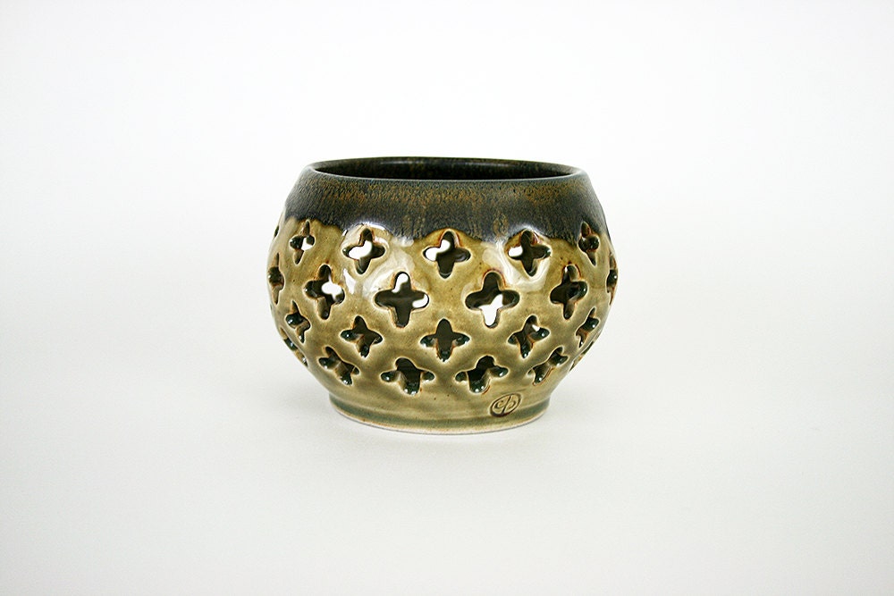 Ceramic candle holder in olive green