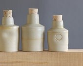 three bottles made in 2001 by shelley martin