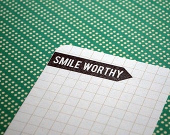 SMILE WORTHY : unmounted red rubber stamp