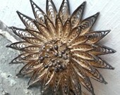 vintage mod floral sunburst goldtone metal brooch pin, 1950s