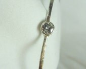 Kelly's Bangle: A Bezel Set 5mm/Half-Carat Moissanite Solitaire Setting Sterling Silver Bangle