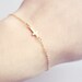 tiny sideways cross bracelet - dainty, minimalist gold jewelry