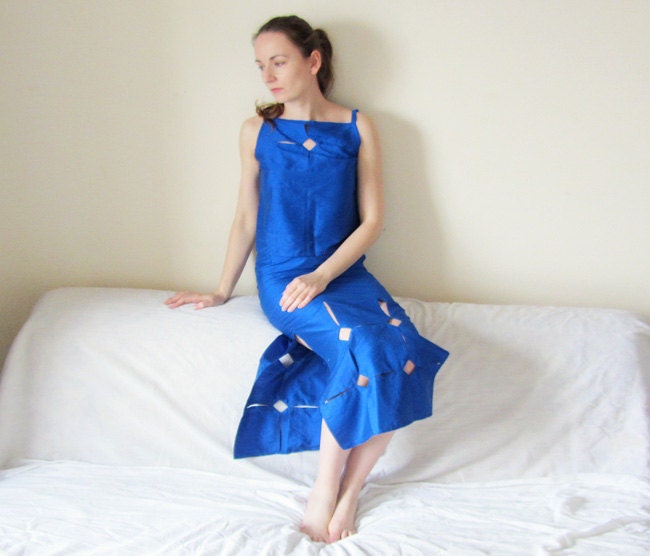 Structured, geometrical cut-out skirt made from pure silk in electric blue colour
