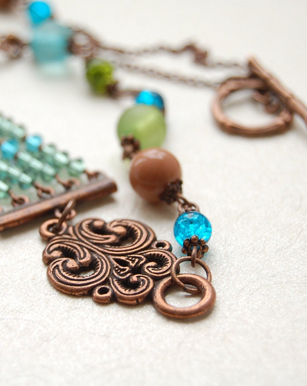 Asymmetric oriental copper, turquoise blue, olive green, brown Swarovski crystal glass beaded necklace with chain and toggle clasp