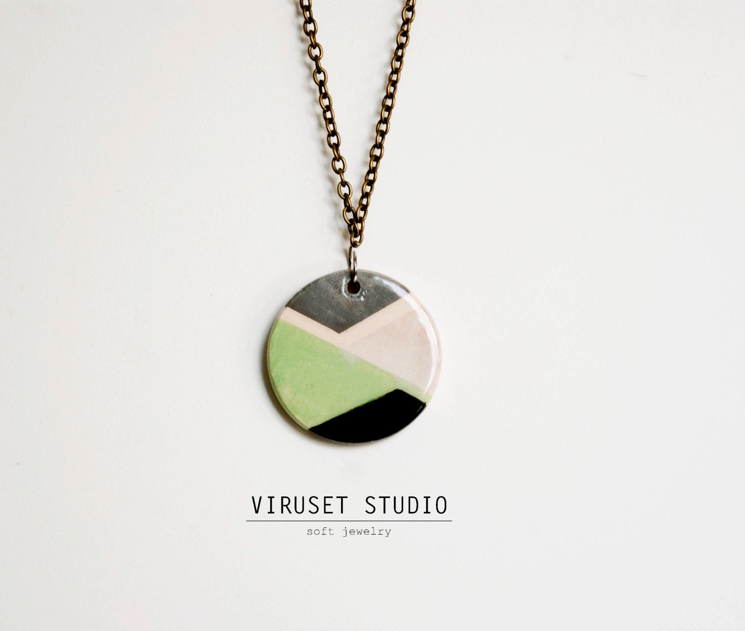Ceramic necklace green and black scandinavian inspiration completely handmade by Viruset Studio ceramic jewelry