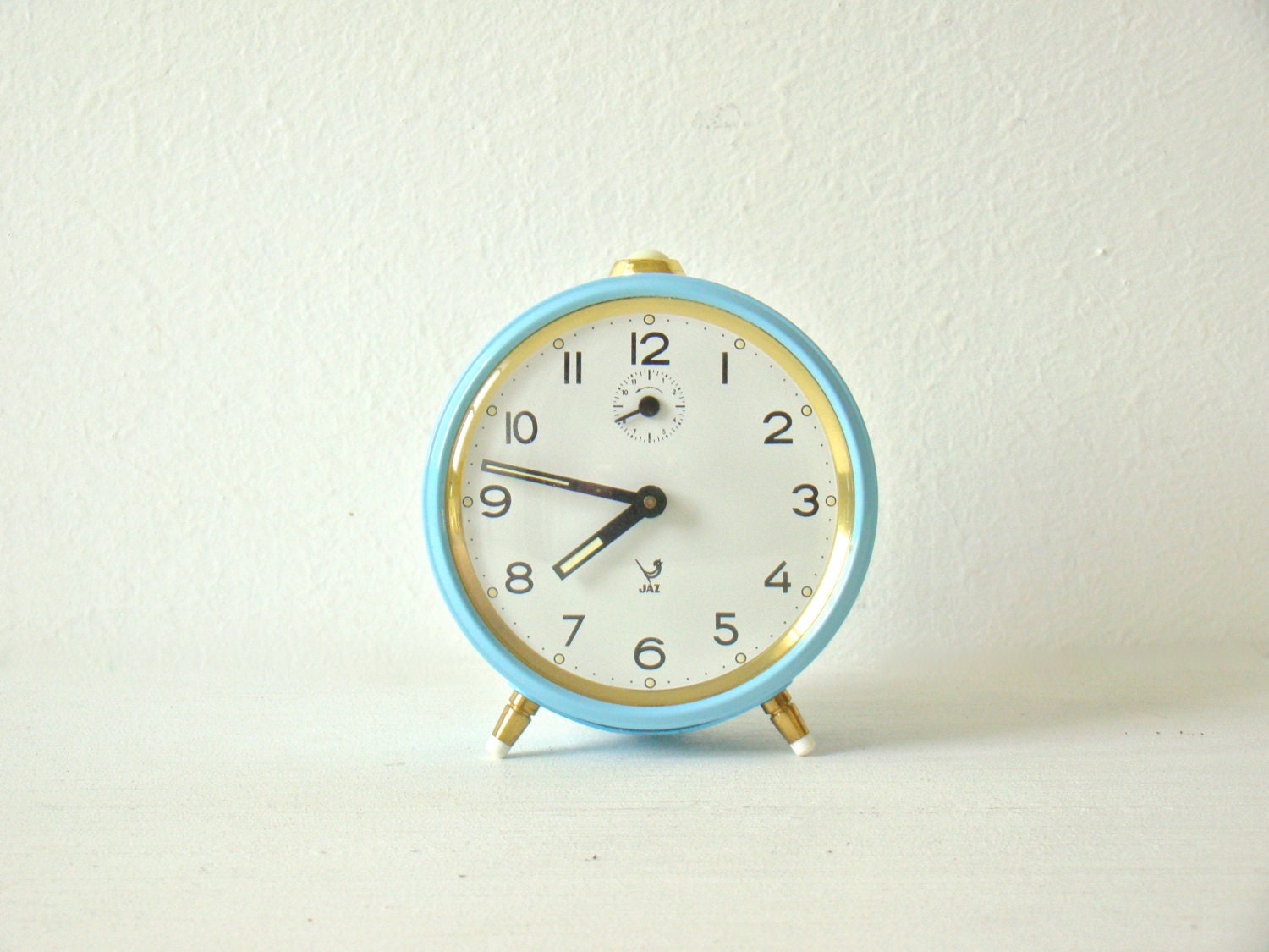 Charming vintage french JAZ light blue wind-up alarm clock, blue and gold metal frame, Working vintage mechanical alarm clock