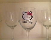 custom, embellished wineglass or beer mug with Hello Kitty design in Swarovski crystals