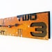 Outnumbered III Modern Wall Clock (Rusted) w/ Black Back