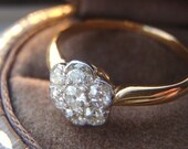 Vintage Edwardian Platinum & 18K Gold Engagement Ring. Antique Old European Cut Diamonds in a Sweet Daisy Cluster. Classic and Elegant.