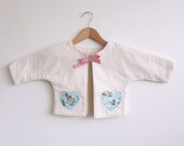 SALE: quilted baby jacket with vintage fabric pockets