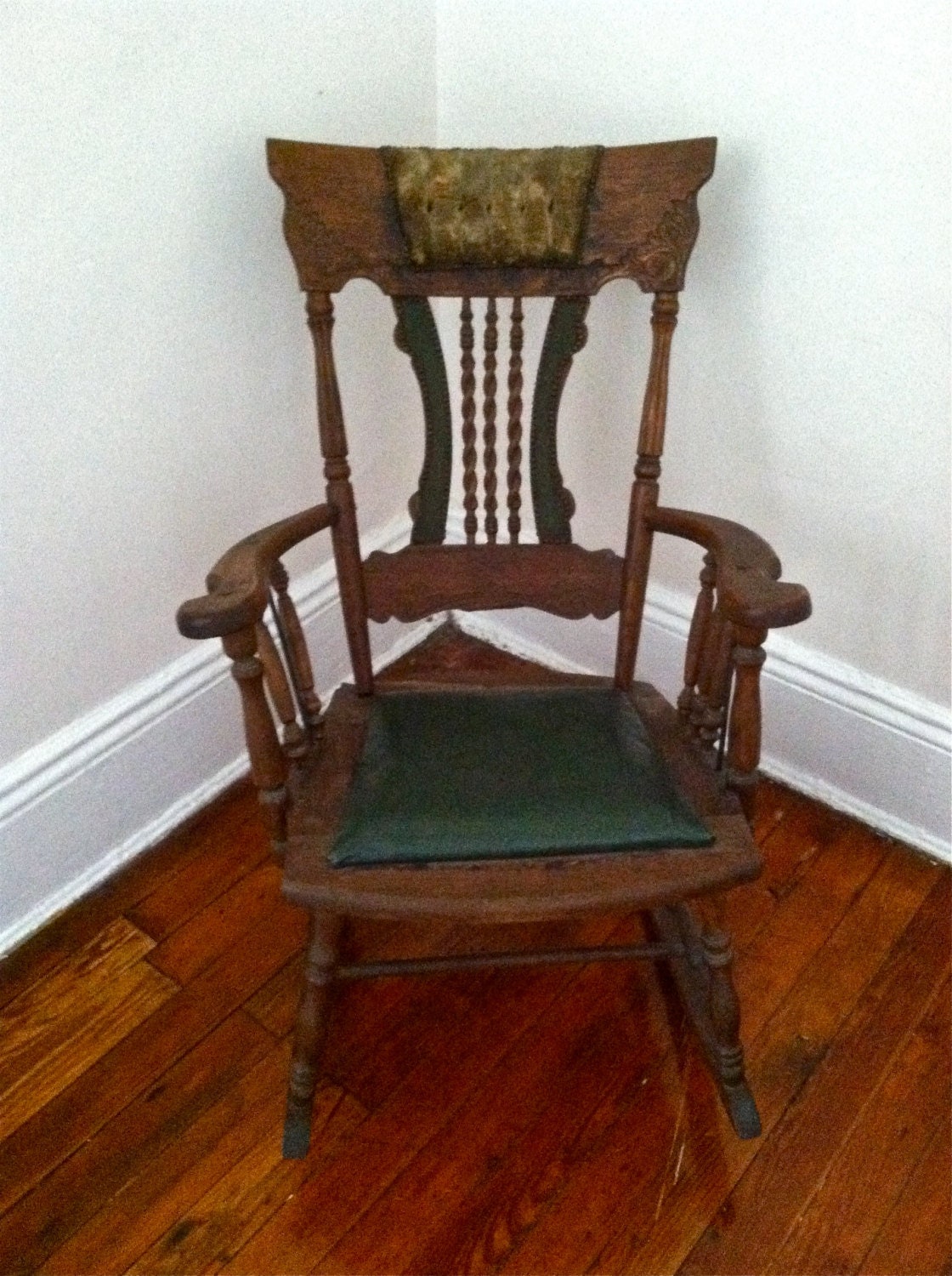 Items similar to Antique Carved Wooden Rocking Chair with