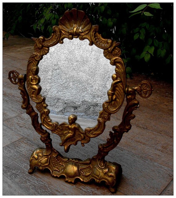 Items similar to French antique solid bronze Vanity Mirror with cherubs