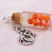 Dragon Ball Z inspired Dragon Balls vial necklace or keychain. Make a wish.