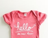 Hello I'm New Here - Funny text baby onesie (6-12 mo - coral)