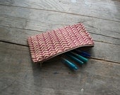 hand-printed organic cotton canvas zipper pouch, gold and wine herringbone pattern