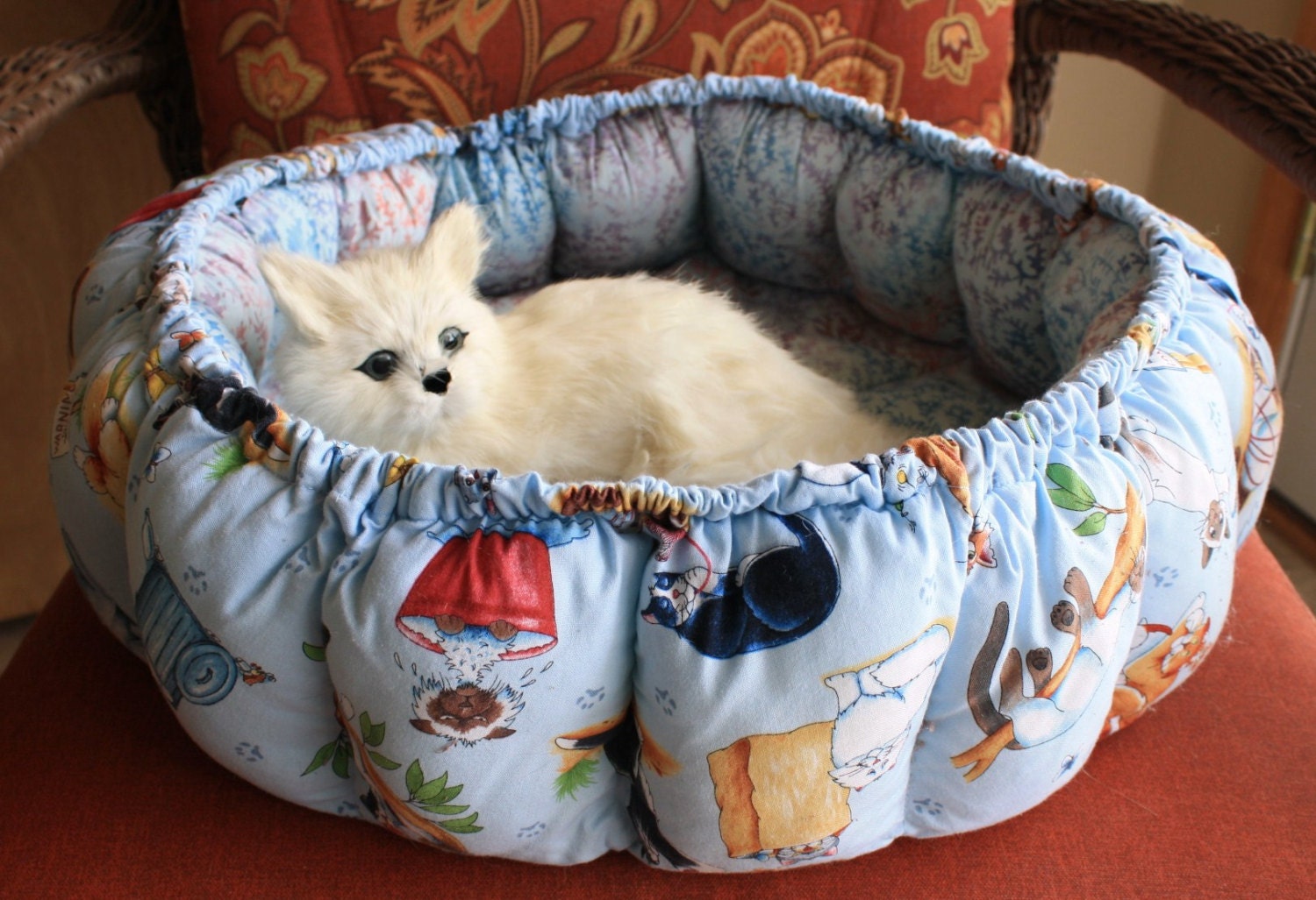 Cat Bed Covered With Zany Cats In Blue