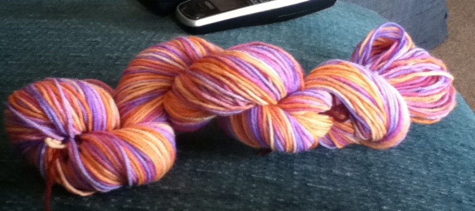 Totally Wool Yarn In the Colorway of Sweet Tarts 190 yards