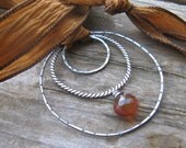 necklace - rustic silver rings on brown hand dyed silk ribbon with warm caramel chalcedony