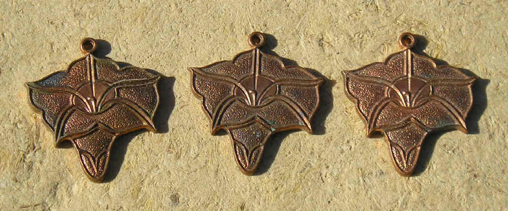 Beautiful old French gingerbread brass Morning Glory charms for earrings and a pendant..