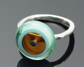 Medium Glass Circle Ring in Amber, Sky Blue, and Pale Emerald Green