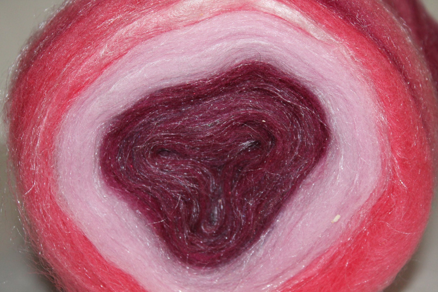 Merino and tussah silk center pull self striping roving.  Porsche.  4.6oz