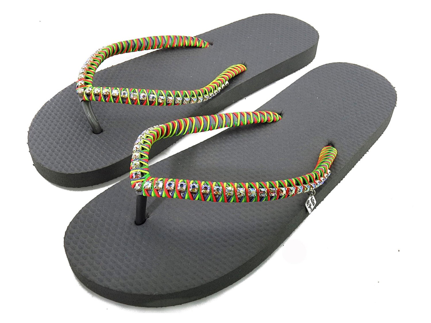 Women custom made designed rubber sandals. Decorated grey flip flops swarovski, orange, green, purple and yellow neon strings.