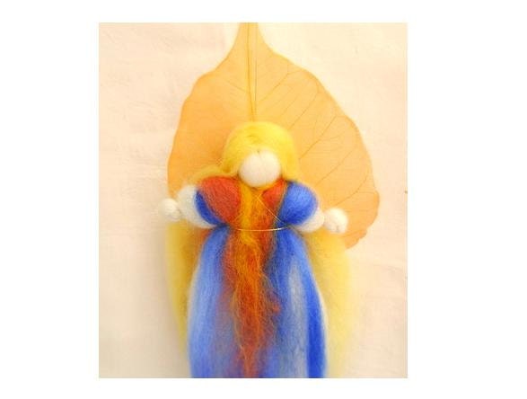 Wool blessing fairy art doll Waldorf education in blue and orange