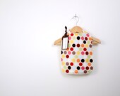 super sweet bib for baby, retro toned polkadot print, parent-friendly.