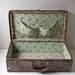 antique brown leather suitcase from 1900s