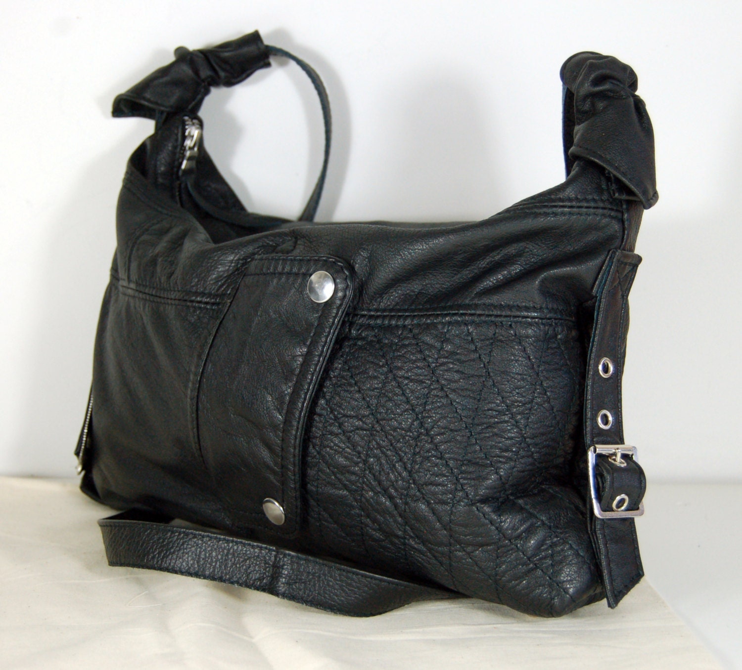 Bibi, Handmade black leather shoulder biker bag.