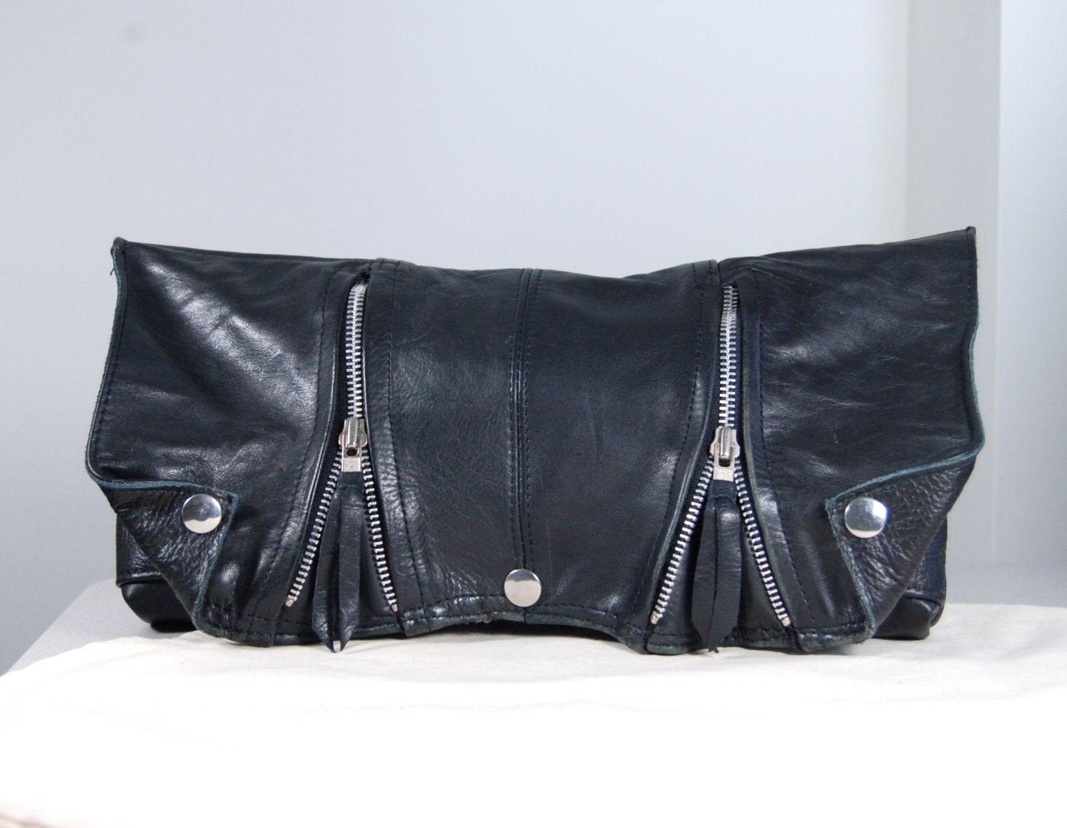 Bibi, Handmade black leather clutch biker bag.