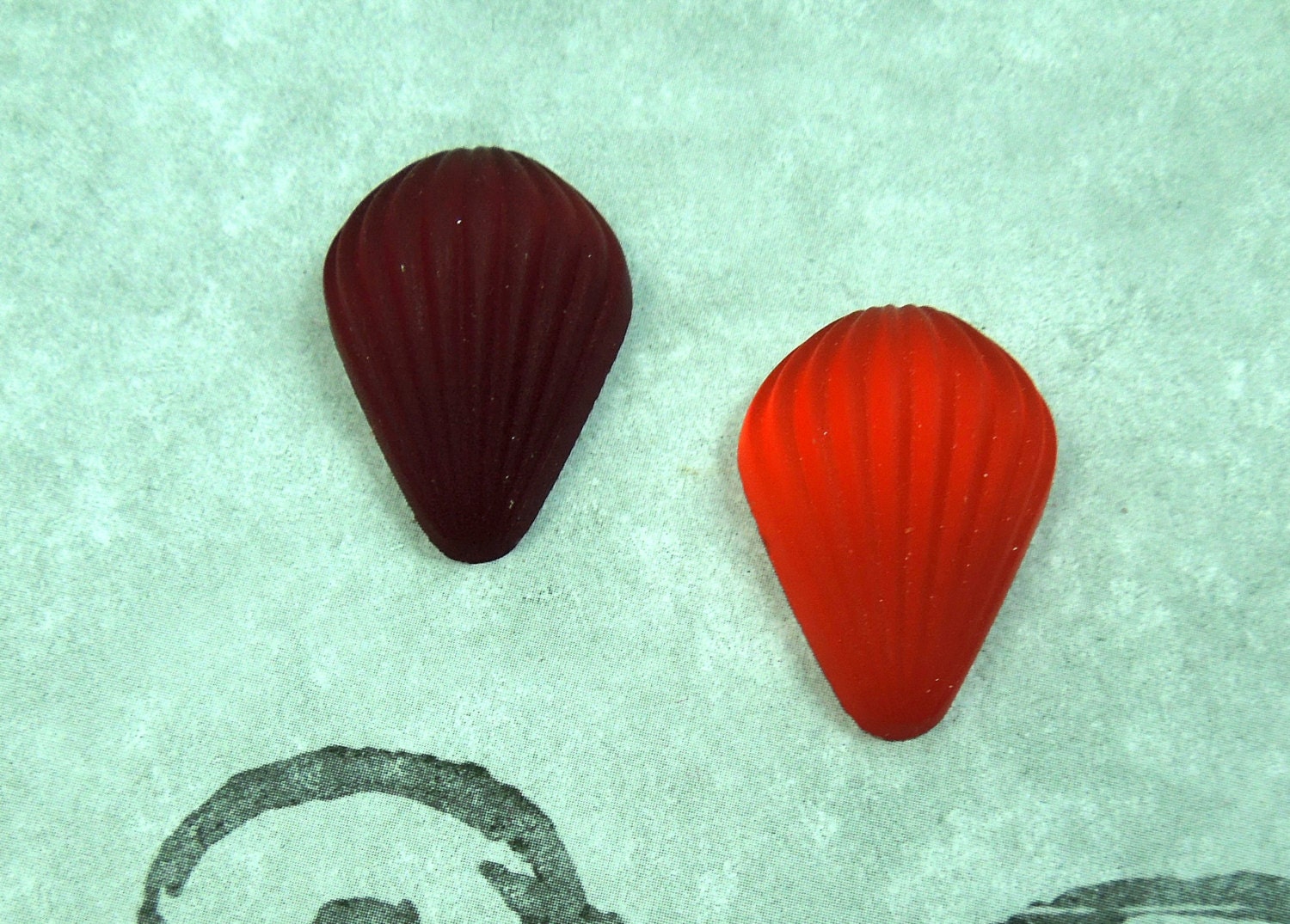 Preciosa foiled matte fluted glass pears in two colors of red