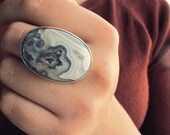 Crazy lace agate and sterling silver ring.