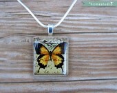 PAPILLON (Yellow) : on a pendant charm made from a Scrabble Game Tile piece