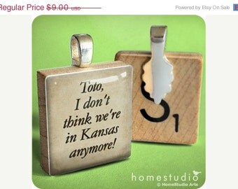 Moving Sale - KANSAS : a jewelry pendant made from a Scrabble Game Tile game piece . Wizard of Oz