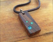 Modern Minimalist Tamboti Exotic Hardwood Pendant with emerald green circles