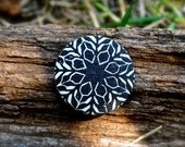 Pinback button brooch, lino print, black and white