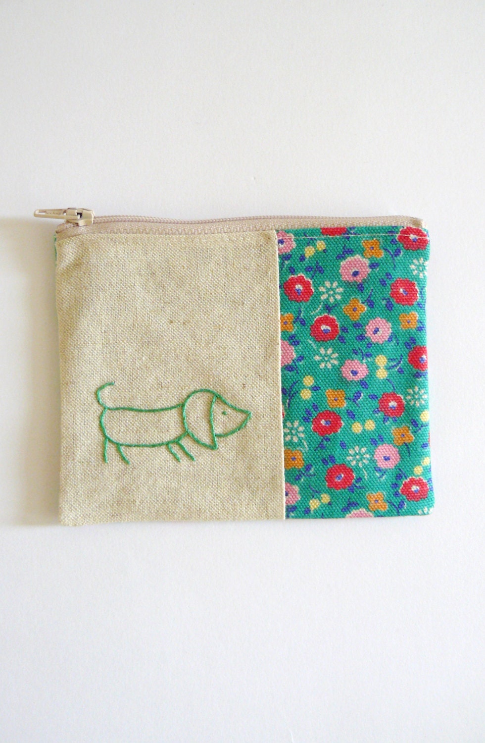 sausage dog embroidered in green floral coin purse