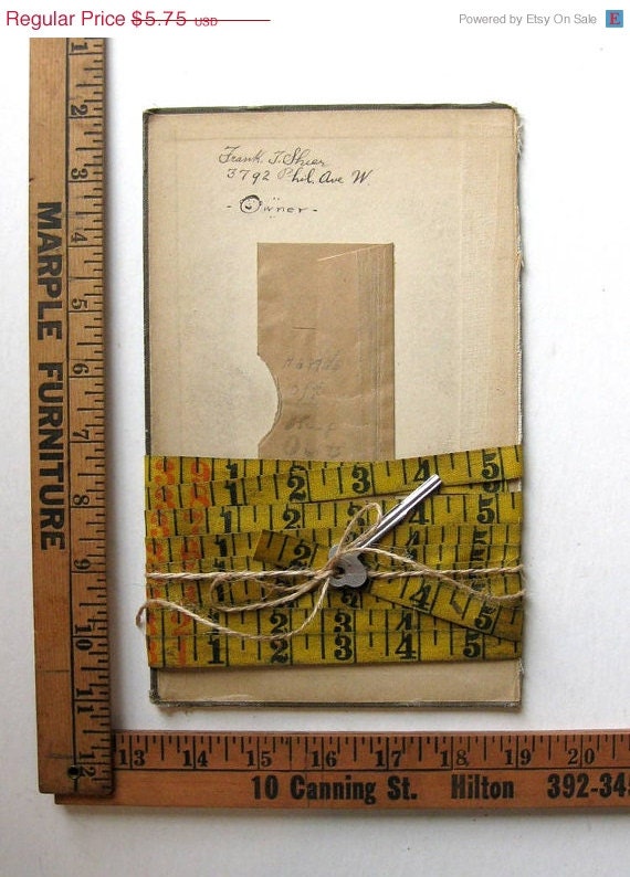 Pickers Sale. Vintage Aged Yellow Linen Measuring Tape (9 feet) on Vintage Math Book Cover No 2, with  Unusual Key