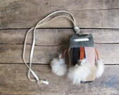 vintage 1970s patchwork suede drawstring pouch with rabbit fur tassels