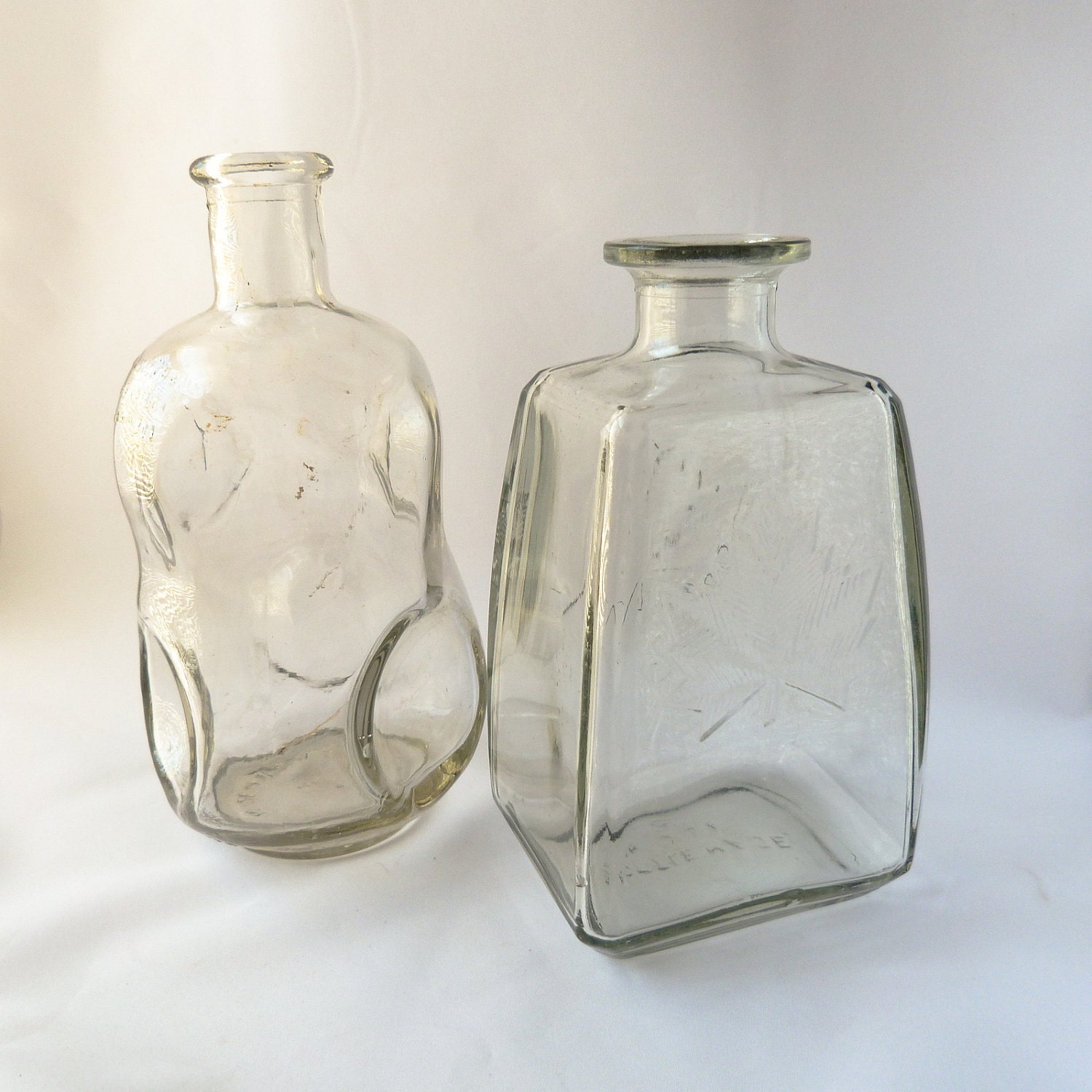 Post Prohibition Whiskey Bottle and Canadian Maple Leaf Carafe - Lot of 2 Clear Glass Bottles