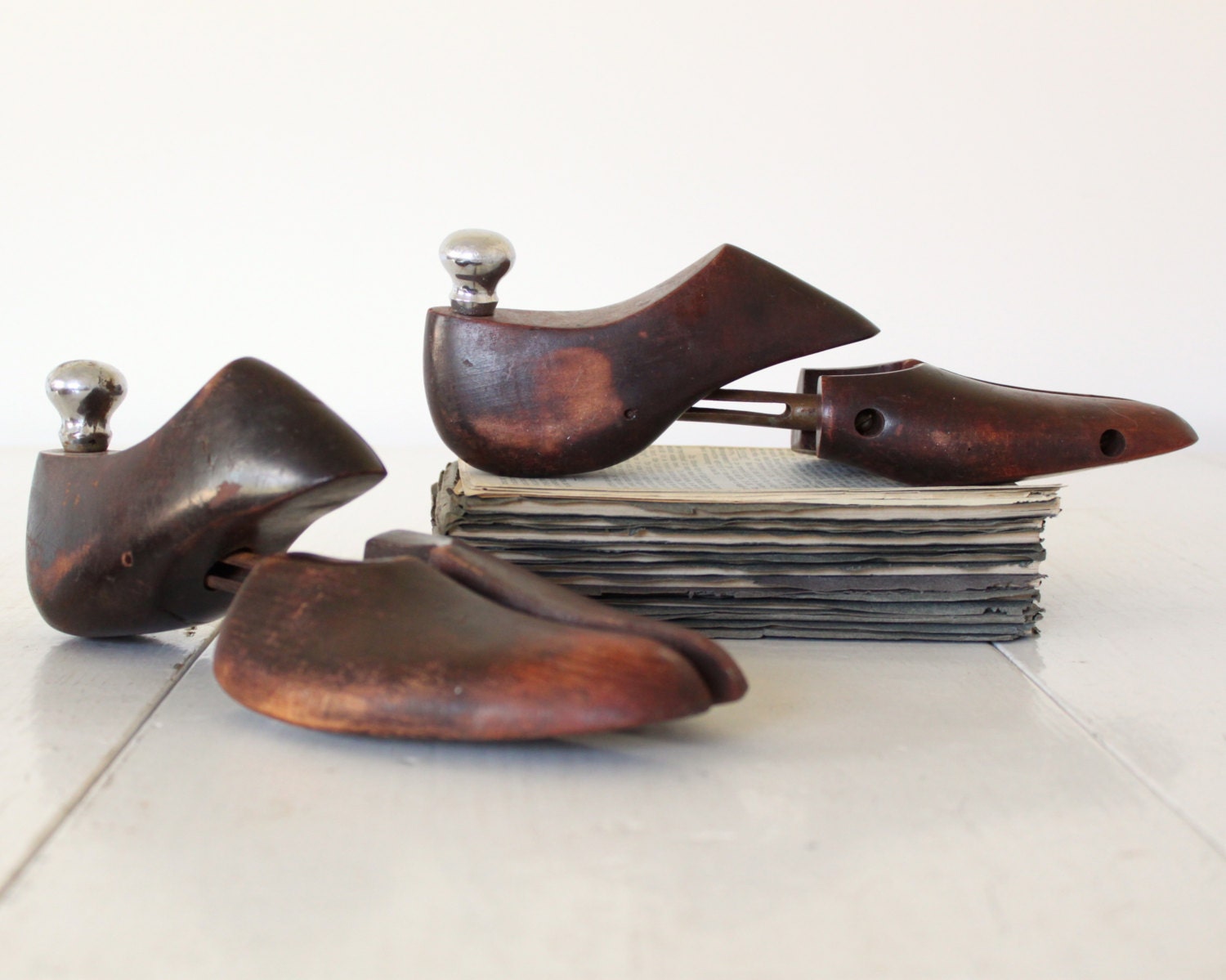vintage 1920s men's shoe forms. antique industrial. coffee brown hardwood shoe trees. Gatsby era.