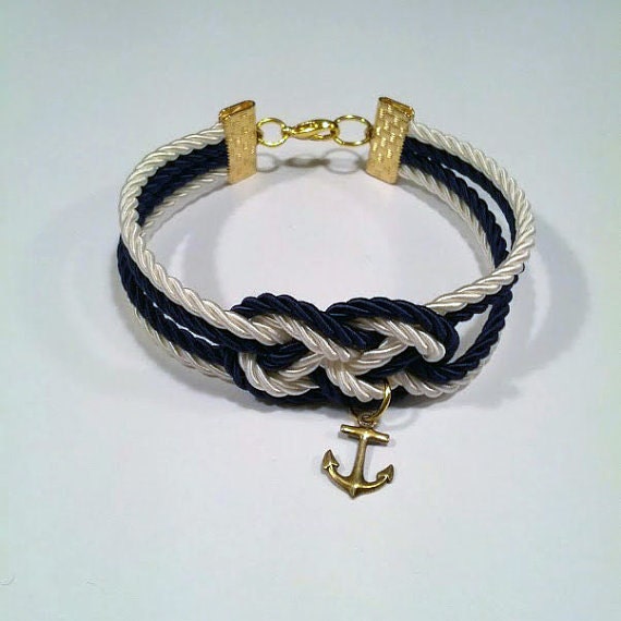 Navy blue and ivory cream double infinity knotted nautical rope bracelet with gold anchor charm