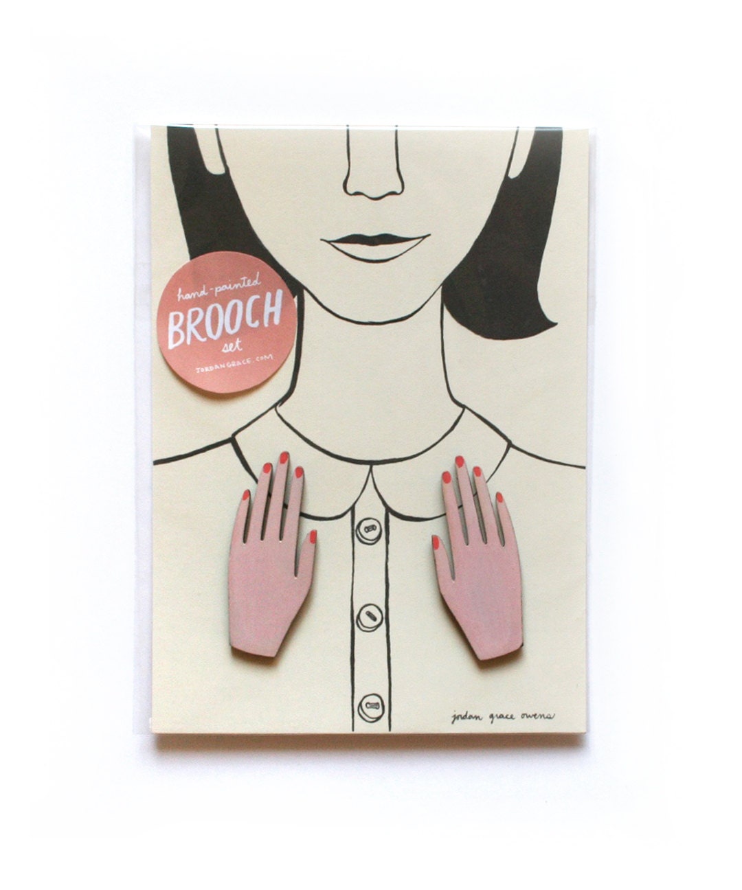 pair of hand-painted hand brooches
