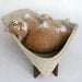 Retro modern pet bed in ivory nubby upholstery