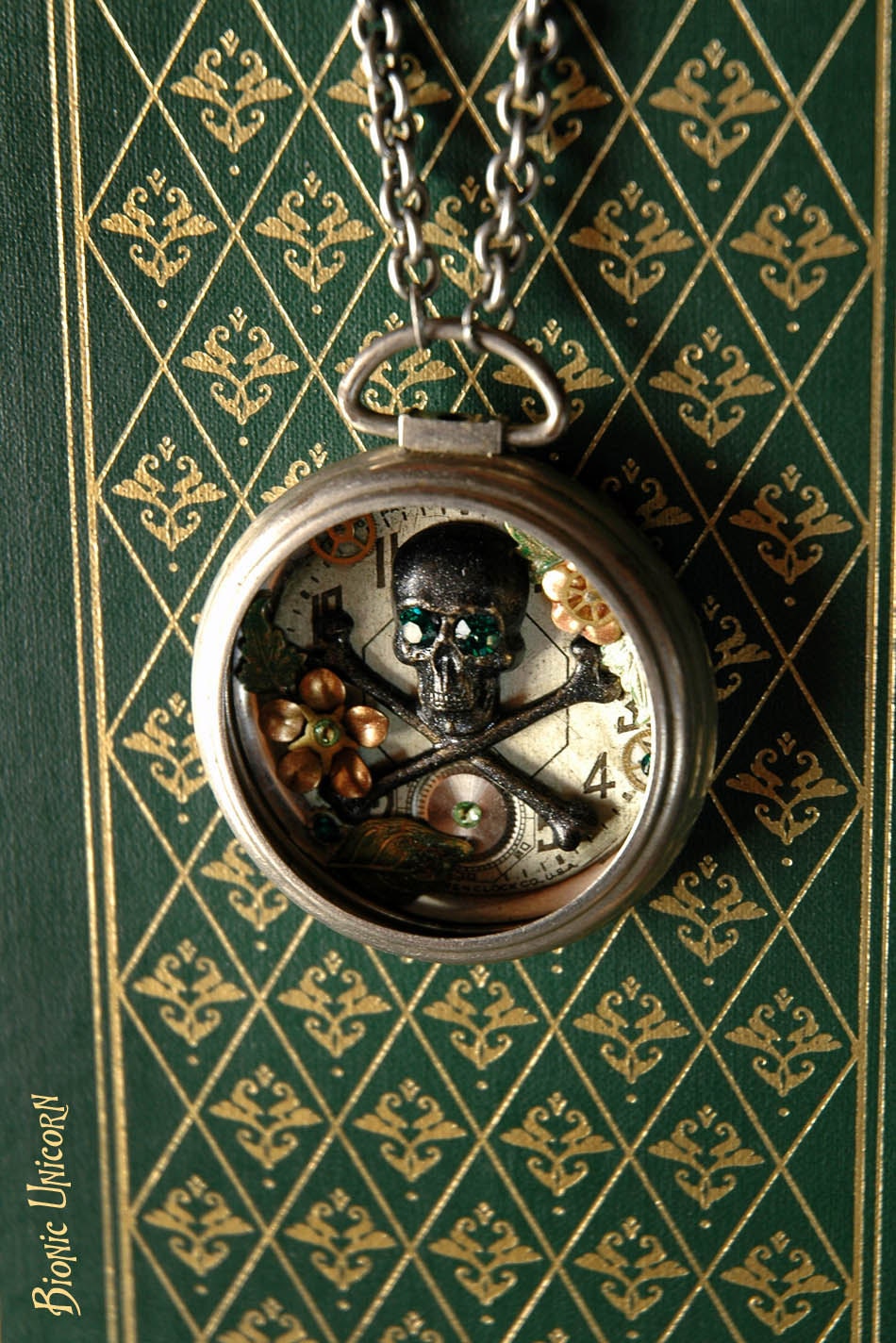 Steampunk Skull and Crossbones Pocket Watch Necklace - Black Skull with Emerald Crystal Eyes Rose Gold Flowers and Steampunk Gears