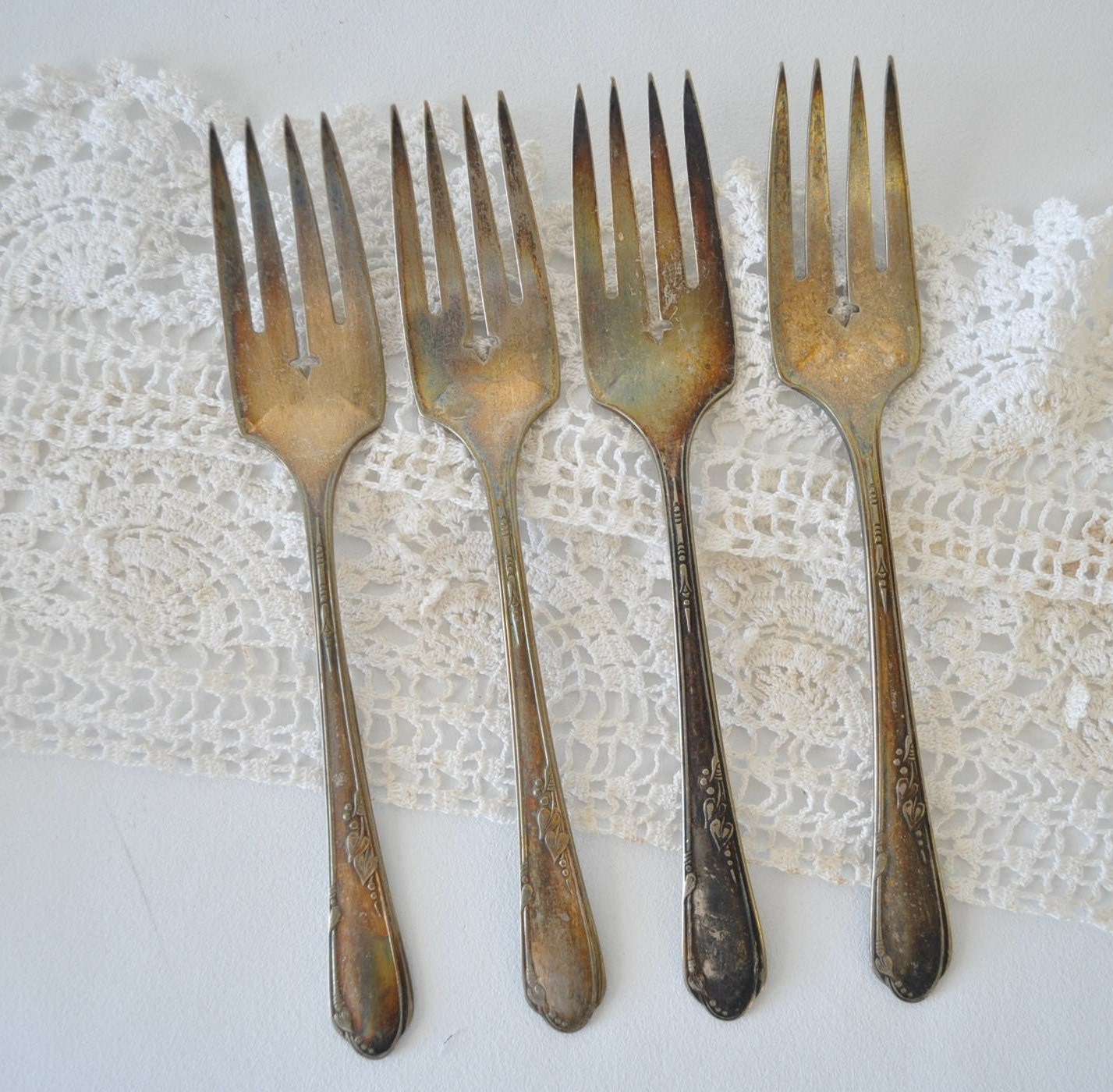 four vintage silverplated salad-dessert forks--WM Rogers