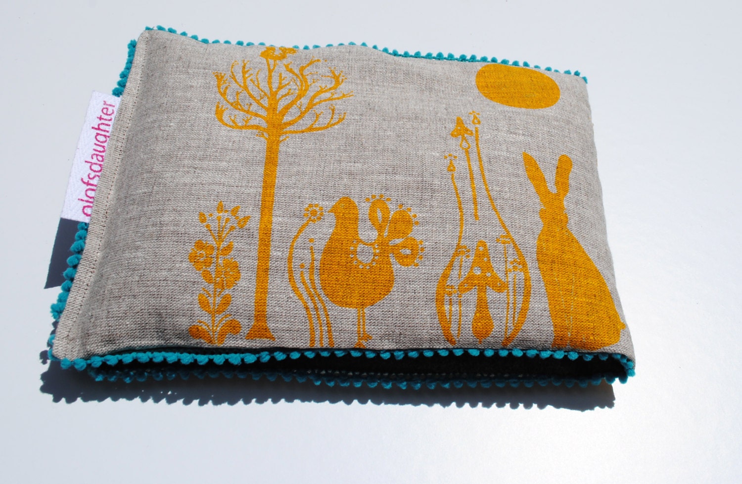 Scandinavian Wonderland hemp Heat Bag in Yummy Yellow and Ticklish Teal.