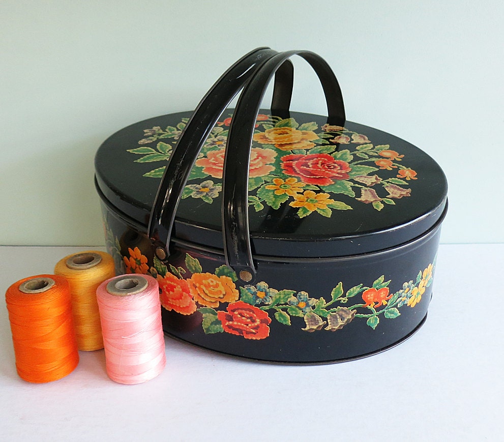 Black Oval Sewing or Picnic Tin with Flowers and a Faux Needlepoint Design