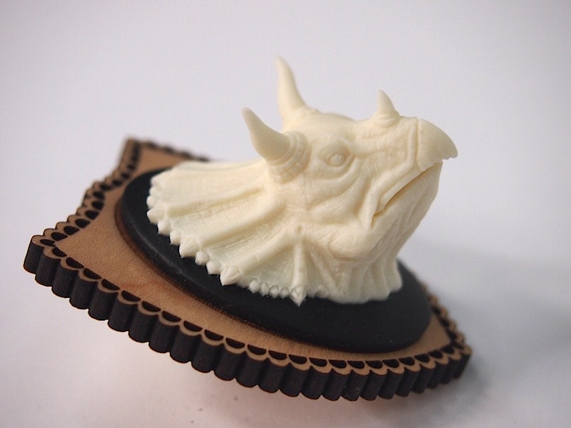 Pretty Things - Triceratops brooch by HungryDesigns